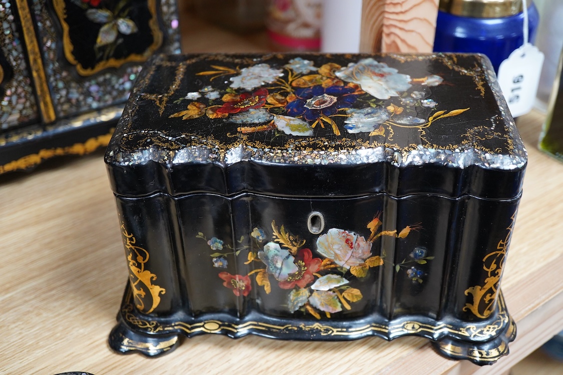Four 19th century mother of pearl inlaid papier mache items, to include, a four drawer cabinet, 26.5cm high, a tea caddy, letter rack and pen dish